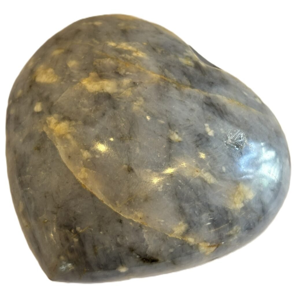 Polished blue calcite heart stone 1 2 sians emporium Polished natural blue calcite heart with soothing denim tones and creamy veining Ideal for meditation palm stone touchwork or elegant crystal displays